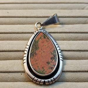 Charles Albert sterling silver pendant.